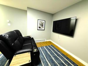 TV a/nebo společenská místnost v ubytování Crossroads at Park Place