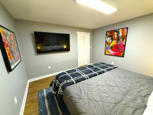 Postel nebo postele na pokoji v ubytování Crossroads at Park Place