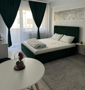 Ένα ή περισσότερα κρεβάτια σε δωμάτιο στο Romantic studio AxS