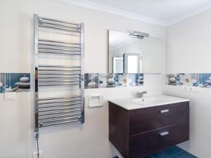 a bathroom with a sink and a shower at Casa Mirador de Murchas in Murchas +29 photos