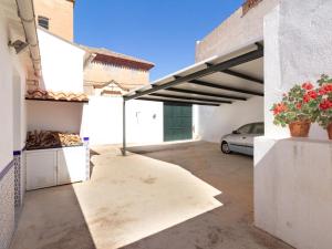 a garage with a car parked inside of it at Casa Mirador de Murchas in Murchas