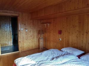 Postel nebo postele na pokoji v ubytování Ferienwohnung Wärschu + 8 fotografií