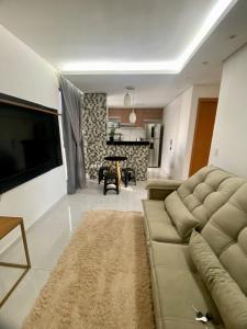 Et tv og/eller underholdning på Lindo apto com portaria 24h, região central