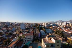an aerial view of a city with buildings at Luxury Apartment with Parking in Tirana