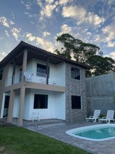 La alberca dentro o cerca de Casa com piscina no Campo D'Una 5 fotos más