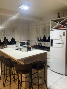 Una cocina o cocineta en Casa com piscina no Campo D'Una