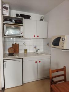 Kuchyň nebo kuchyňský kout v ubytování Studio centre station + 1 fotografie