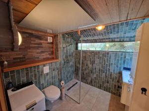 Koupelna v ubytování Het boothuis