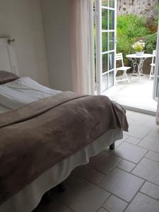 Ένα ή περισσότερα κρεβάτια σε δωμάτιο στο visitHOMES Faroe Islands