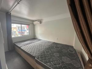 Ένα ή περισσότερα κρεβάτια σε δωμάτιο στο lối nhỏ homestay +2 φωτογραφίες