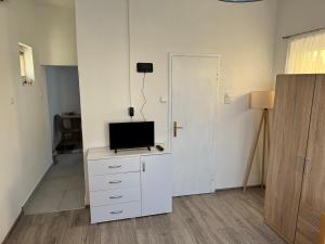 Η κουζίνα ή μικρή κουζίνα στο Apartman Dragana +4 φωτογραφίες