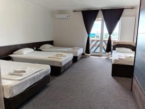 Postel nebo postele na pokoji v ubytování Dalex Events & Spa