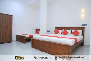 Postel nebo postele na pokoji v ubytování Moon Town