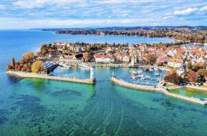 an aerial view of a town on a body of water at Gasthaus Adler Konstanz in Konstanz