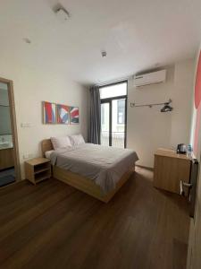 Postel nebo postele na pokoji v ubytování Homestay Minh Nguyệt