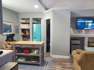 Μια τηλεόραση ή/και κέντρο ψυχαγωγίας στο Cozy Studio