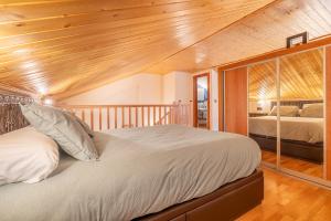 Postel nebo postele na pokoji v ubytování Zenith Sierra Nevada