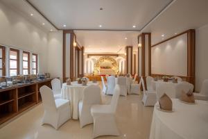 a banquet hall with white tables and white chairs at Himalayan Gateway By Dept Of Tourism, GTA in Jāmb