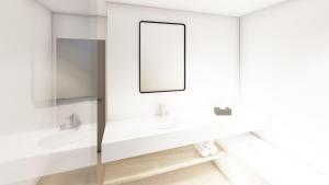 a bathroom with two sinks and a mirror at OakstoneLodge- Gite avec Jacuzzi Piscine et Sauna in Houyet