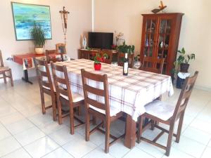a dining room with a table and chairs at Wohnung Katarina Auf Der Insel Pag in Zubovići +11 photos