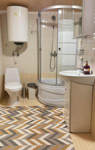 Koupelna v ubytování Drozdovichi Resort