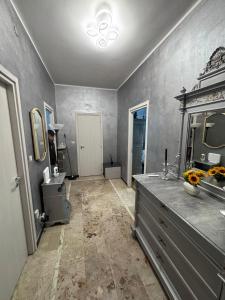 a bathroom with a sink and a mirror at Casa di Dome in Turin