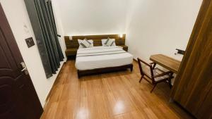 Voodi või voodid majutusasutuse The britishkothi toas