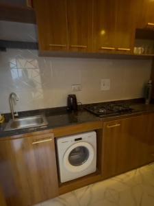 Kuchyň nebo kuchyňský kout v ubytování Corporate Hub