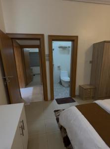 Postel nebo postele na pokoji v ubytování Corporate Hub