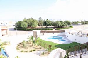 a rendering of a swimming pool at a resort at La Herrada Home in Los Montesinos