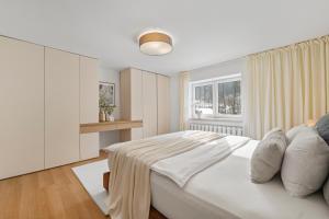 Ένα ή περισσότερα κρεβάτια σε δωμάτιο στο Bečva Residence