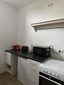 Kuchyň nebo kuchyňský kout v ubytování Wupper Apartments Vogel