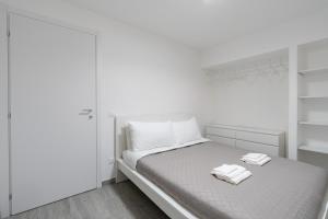 Postel nebo postele na pokoji v ubytování Modern Apartment - Free Parking & Private Entry + 74 fotografií