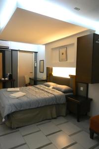 Postel nebo postele na pokoji v ubytování PCB The Seven Gardens Resort & Spa