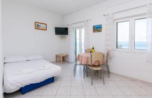 TV a/nebo společenská místnost v ubytování Apartments Marko