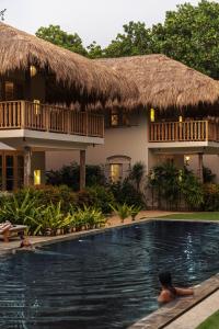 Bazén v ubytování Halcyon Mawella nebo v jeho okolí