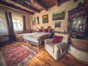 Ένα ή περισσότερα κρεβάτια σε δωμάτιο στο Padláskincsek Vendégház +63 φωτογραφίες