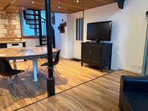 Μια τηλεόραση ή/και κέντρο ψυχαγωγίας στο Loft industriel - hyper centre cambrai