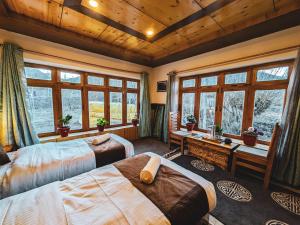 Ένα ή περισσότερα κρεβάτια σε δωμάτιο στο Matho Eco Homestay +10 φωτογραφίες