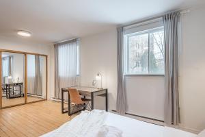 Voodi või voodid majutusasutuse Vintage 3BR 2Bath - Golden Square Mile - Sleeps 8 toas