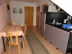 Kuchyň nebo kuchyňský kout v ubytování Appartement Mit Blick Auf Das Wasser + 6 fotografií