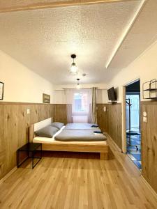 Ένα ή περισσότερα κρεβάτια σε δωμάτιο στο Kael Apartment 2