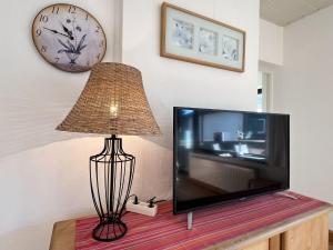 Un televizor și/sau centru de divertisment la Apartment Haus Borzner by Interhome