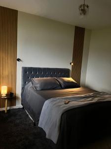 Ένα ή περισσότερα κρεβάτια σε δωμάτιο στο Casa entre Serras