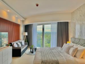 Postel nebo postele na pokoji v ubytování 40 sqm Studio at Aeon Towers + 41 fotografií