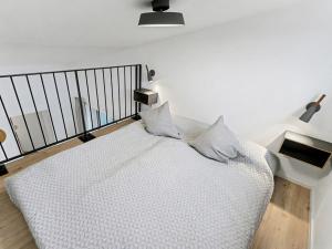 Ένα ή περισσότερα κρεβάτια σε δωμάτιο στο Holiday Home Küstenzauber by Interhome