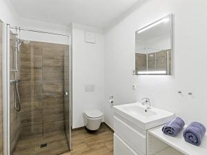 Ένα μπάνιο στο Holiday Home Seeperle by Interhome