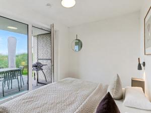 Ένα ή περισσότερα κρεβάτια σε δωμάτιο στο Holiday Home Seeperle by Interhome