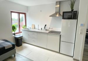 Kuchyň nebo kuchyňský kout v ubytování 78-3 - Apartment in Weener for 3 guests