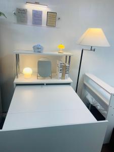 Postel nebo postele na pokoji v ubytování 압구정역도보6분,신사,강남